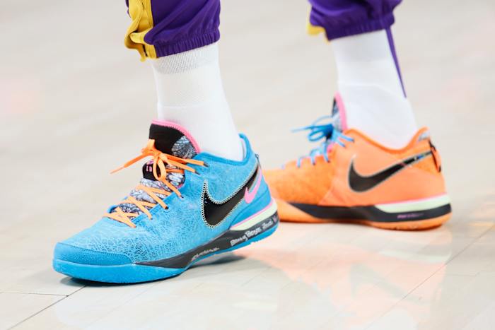 View of LeBron James' blue and orange shoes.